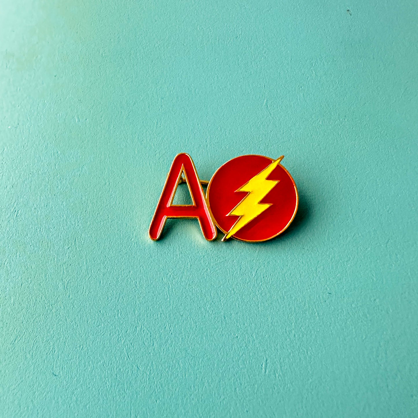 "A" WITH SUPERHERO F NAME PIN