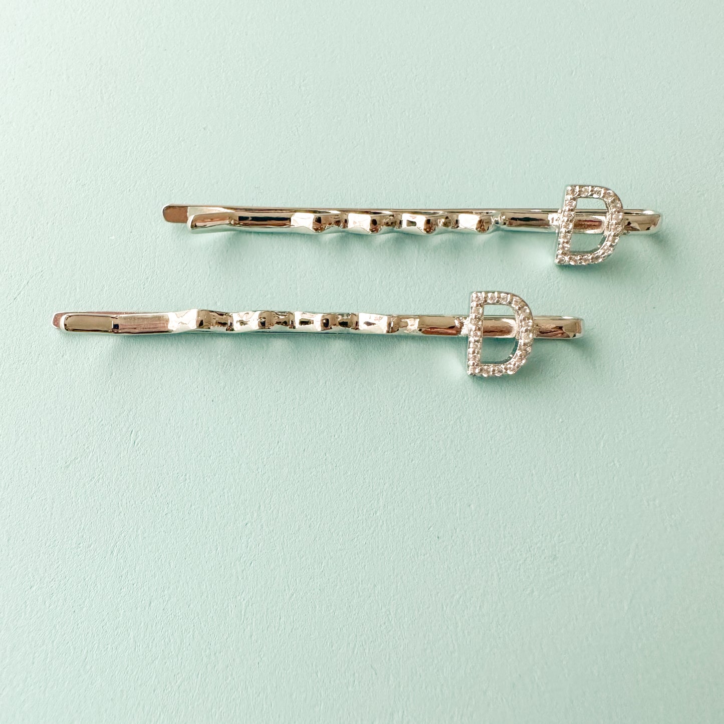 "D" INITIAL IN SILVER POLISH HAIR PINS