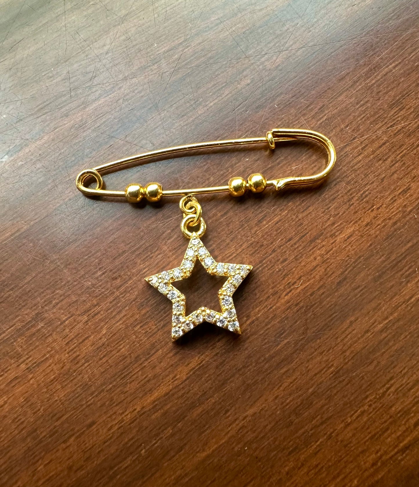 STUDDED STAR LAPEL PIN
