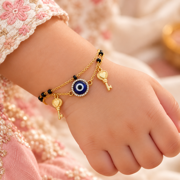 "KEYS WITH EVIL EYE" IN GOLD POLISH
