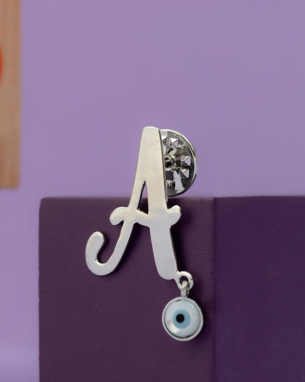 A WITH EVIL EYE HANGING BROOCH WITH SILVER POLISH