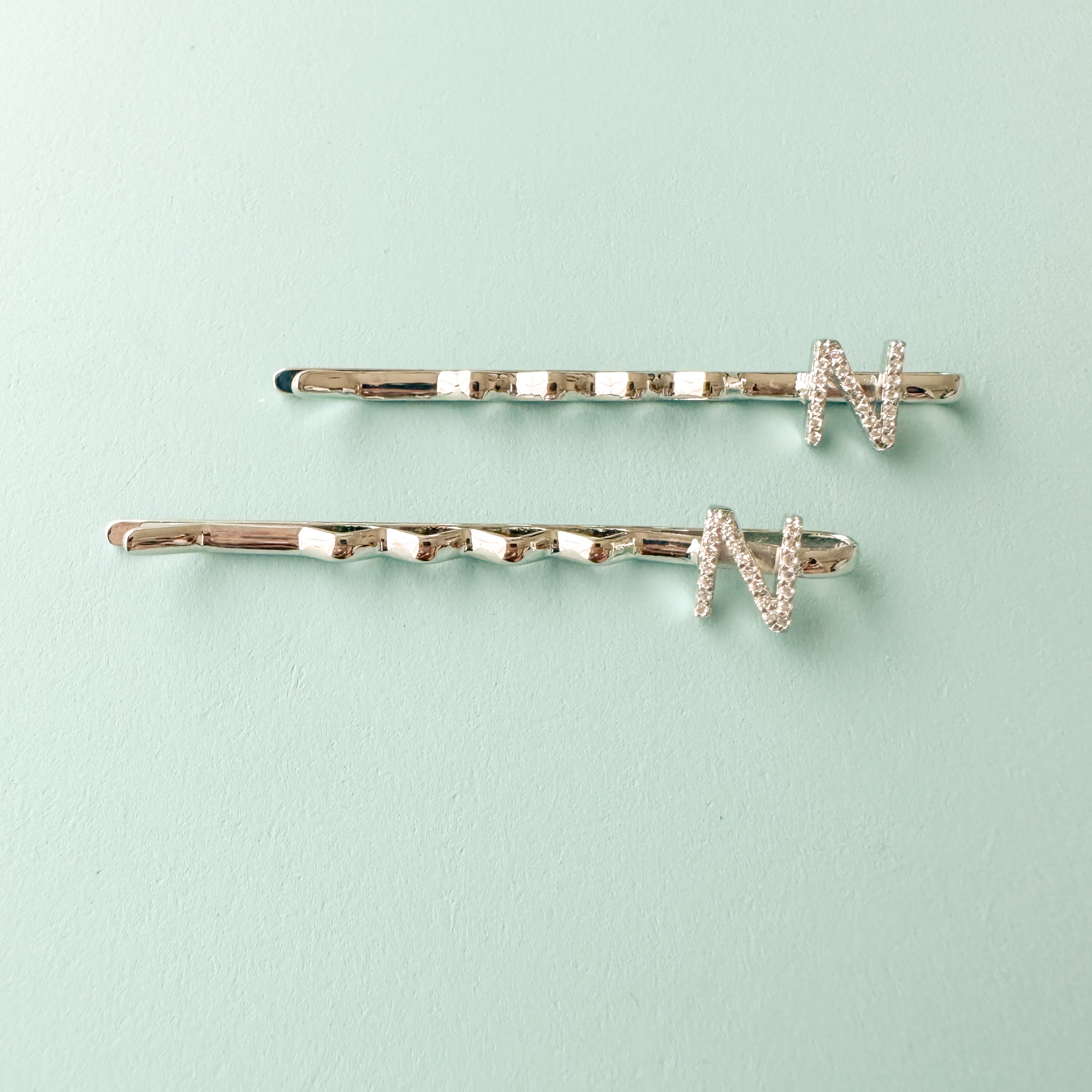 "N" INITIAL IN SILVER POLISH HAIR PINS