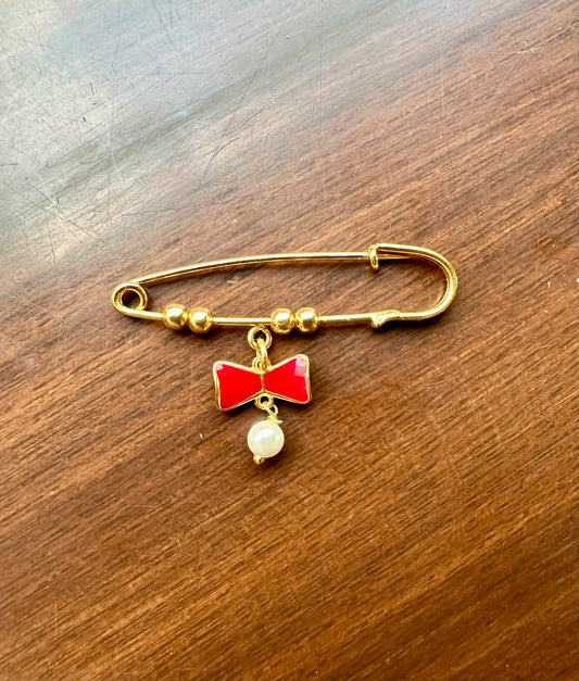 RED BOW LAPEL PIN