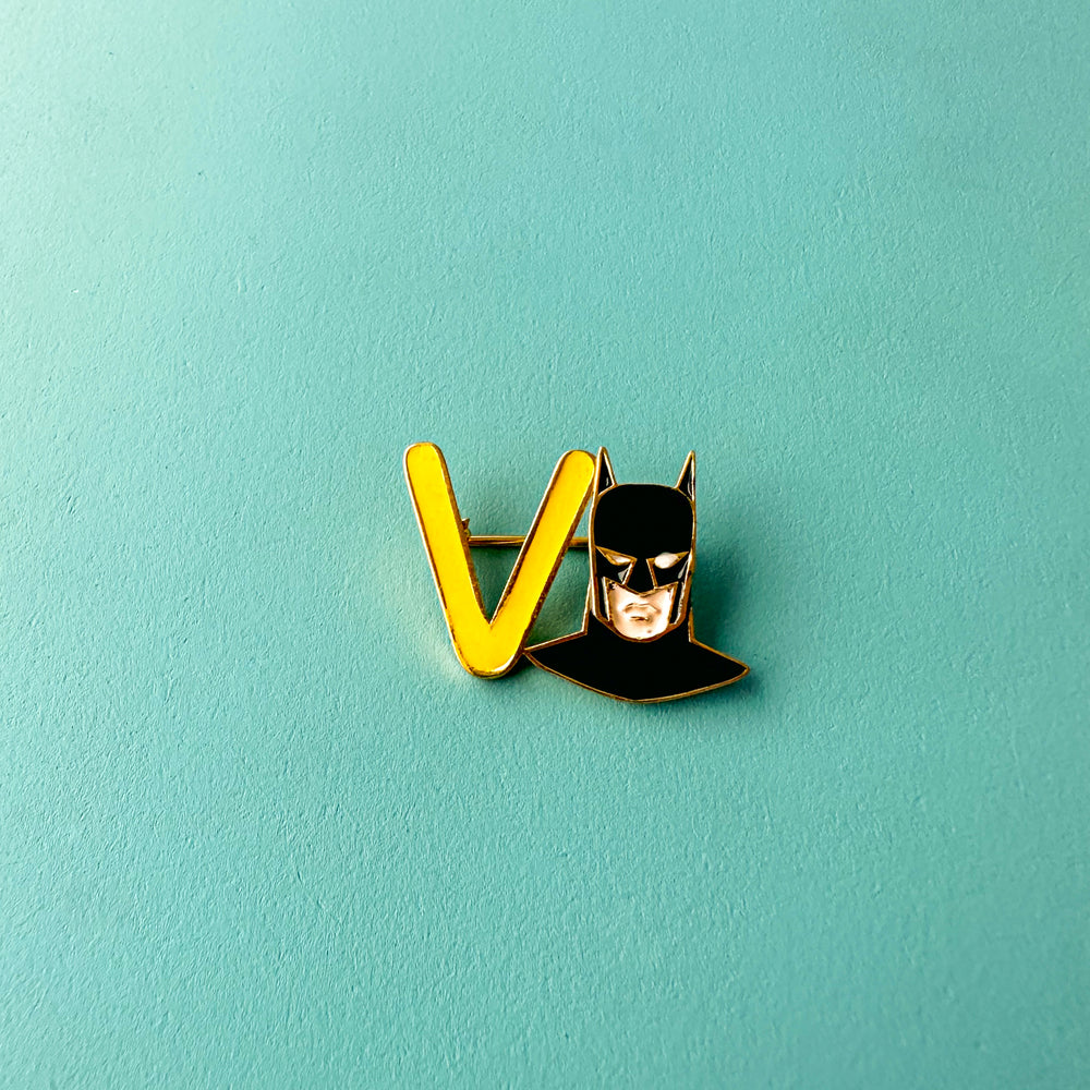 "V" WITH SUPERHERO B NAME PIN