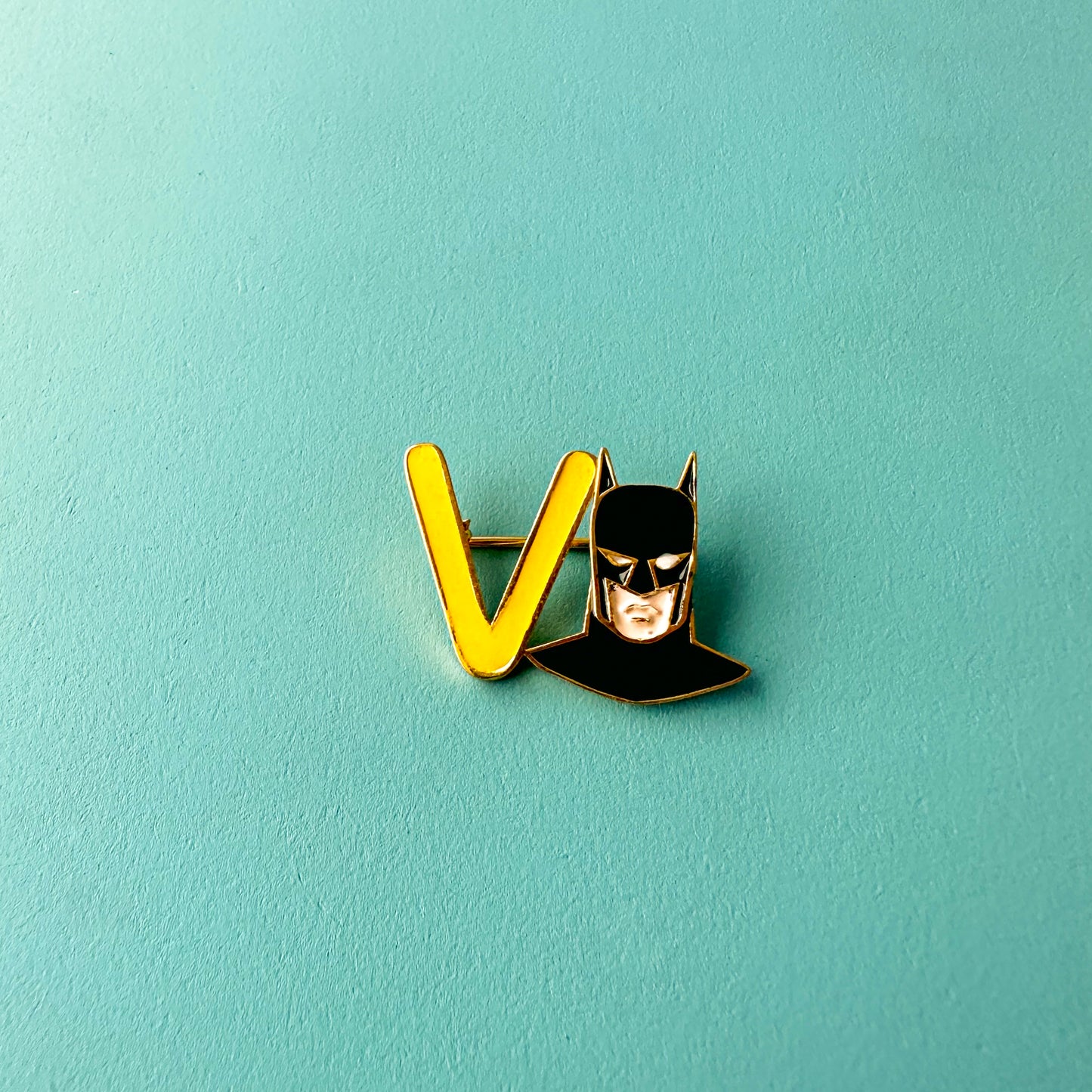 "V" WITH SUPERHERO B NAME PIN