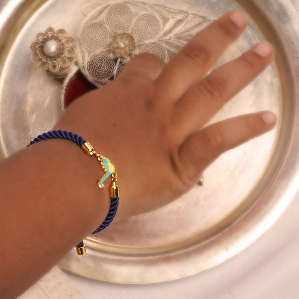 DINOSAUR THREAD BRACELET